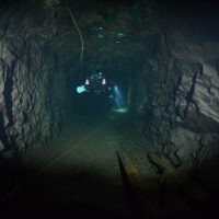 Diving down one of the many passages.