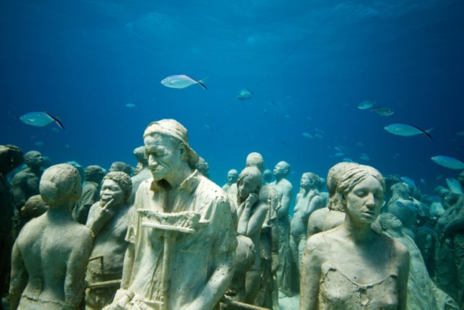 The Silent Evolution, one of many art installations in the Cancun Underwater Museum and an iconic site for divers in Mexico