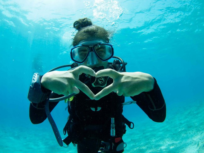heart signal diver underwater