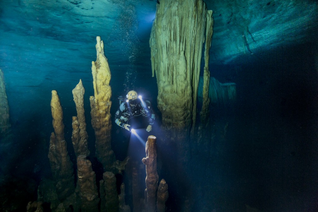 Cristina Zenator exploring a cave in the Bahamas