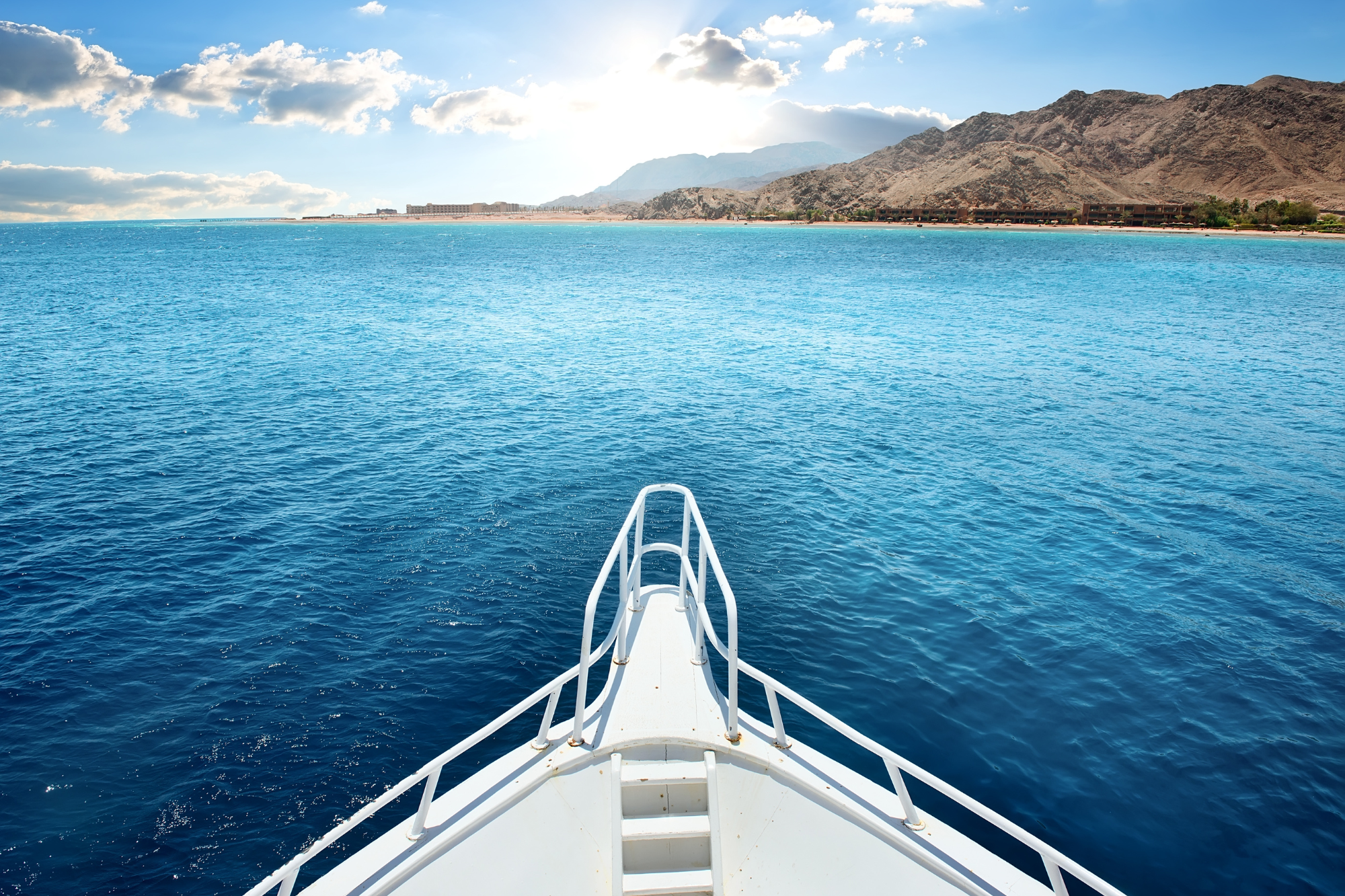 Front of the liveaboard boat, the bow, facing land 