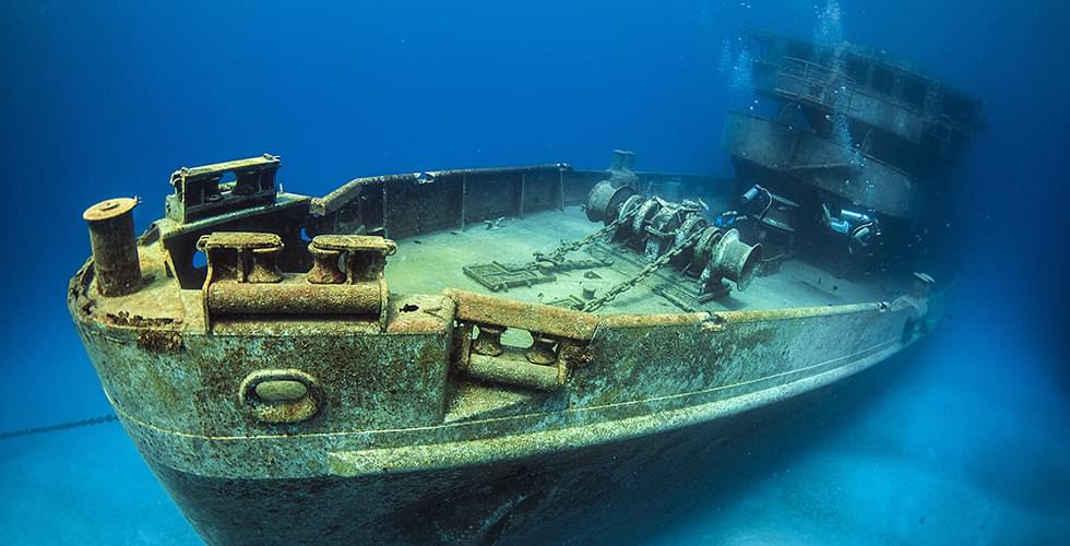 a pair of divers wreck diving in the Caribbean