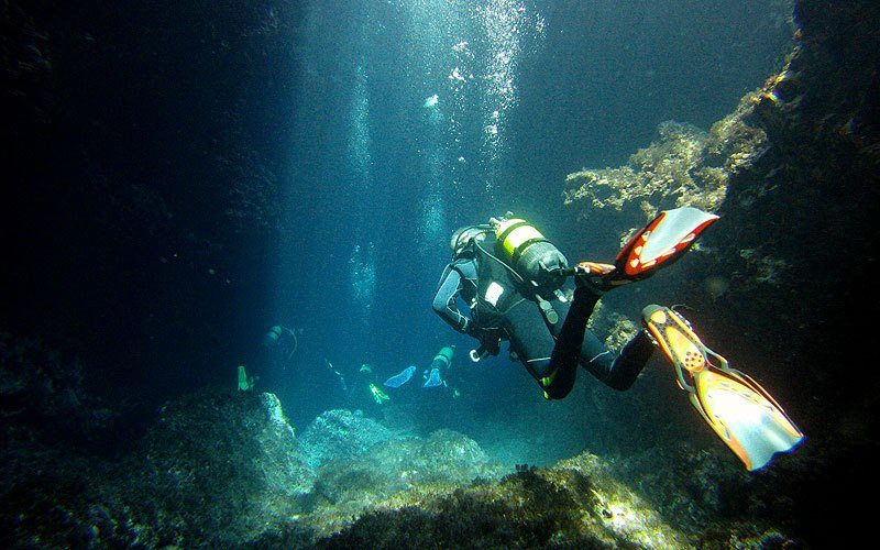 A scuba diver underwater in Ibiza