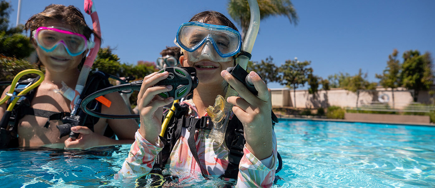 Três Junior Master Scuba Diver de 12 anos de idade compartilham sua paixão com o mundo