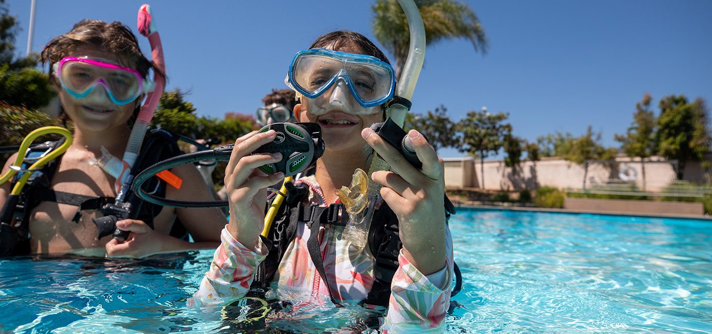 ثلاثة Junior Master Scuba Diver يبلغون من العمر 12 عامًا يشاركون شغفهم مع العالم
