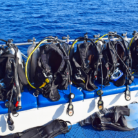 Scuba gear secured on a dive boat.