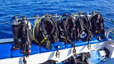 Scuba gear secured on a dive boat.