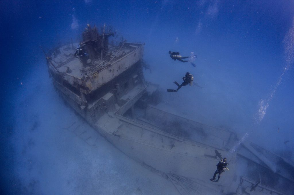 Liz Parkinson and crew diving in the Bahamas after the hurricanes. Photo: Pia Venegas