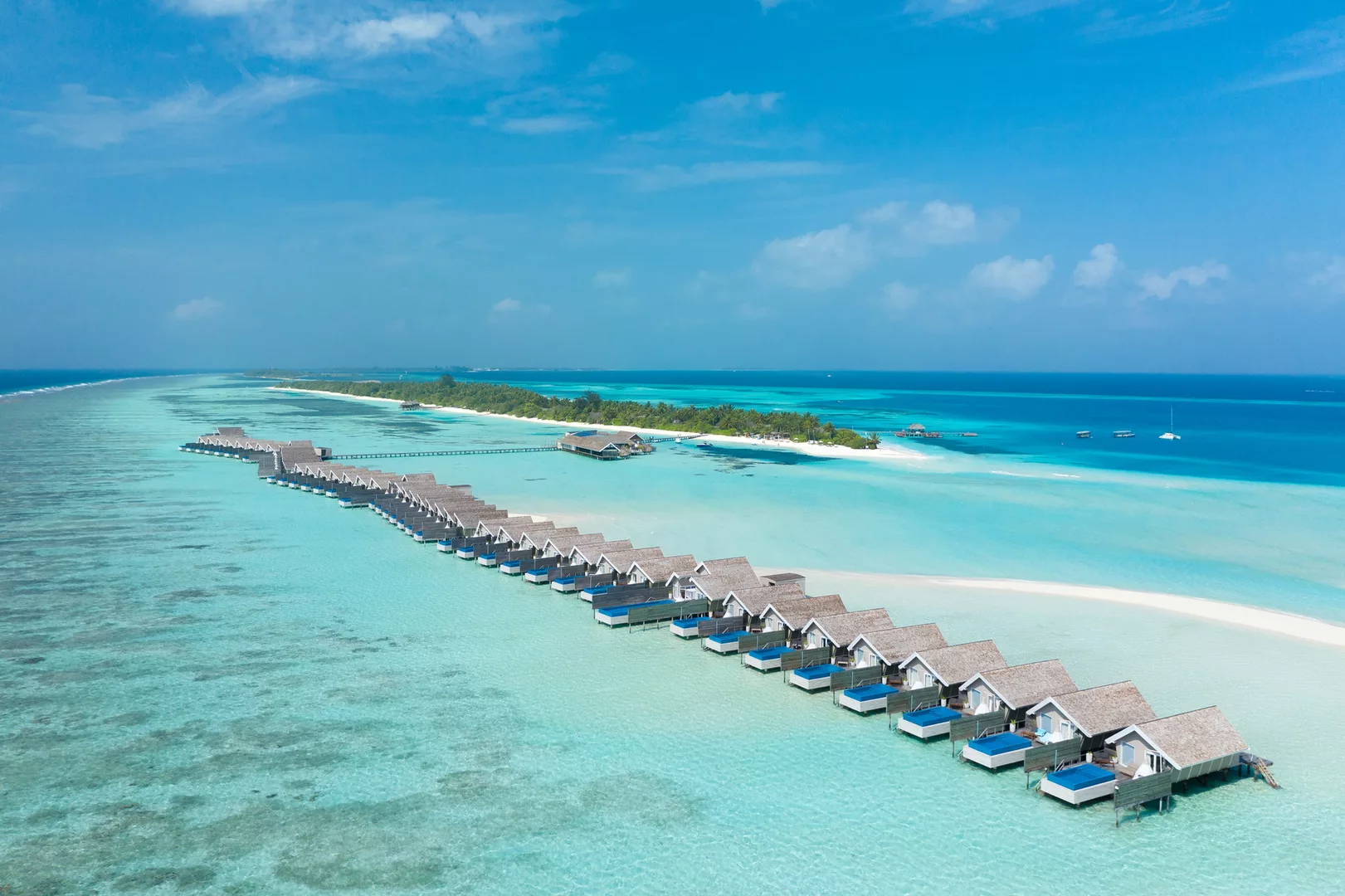 Water bungalows on the white sands of the Maldives