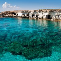 Sea caves near Cape Greko. Mediterranean Sea