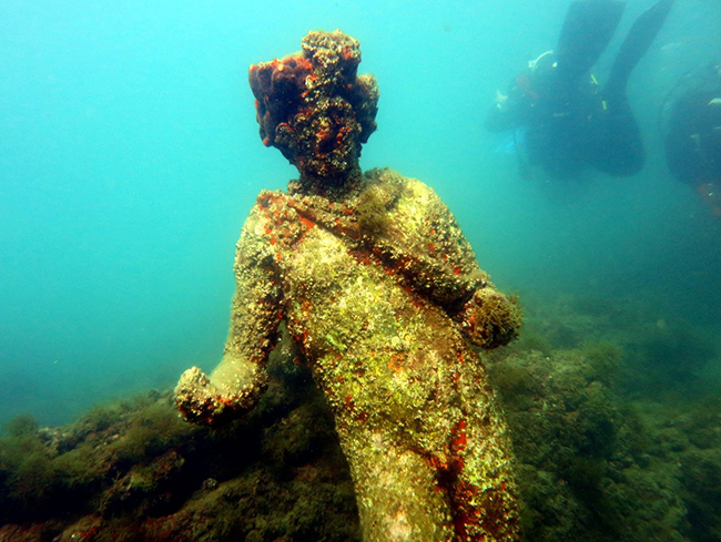Statue at an archaeological dive site in Italy.