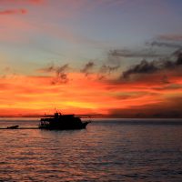 liveaboard vessel in the sunset