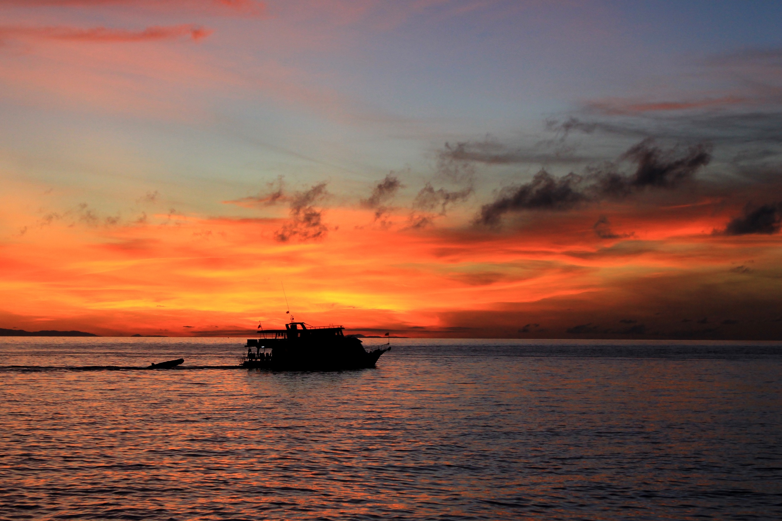 liveaboard vessel in the sunset