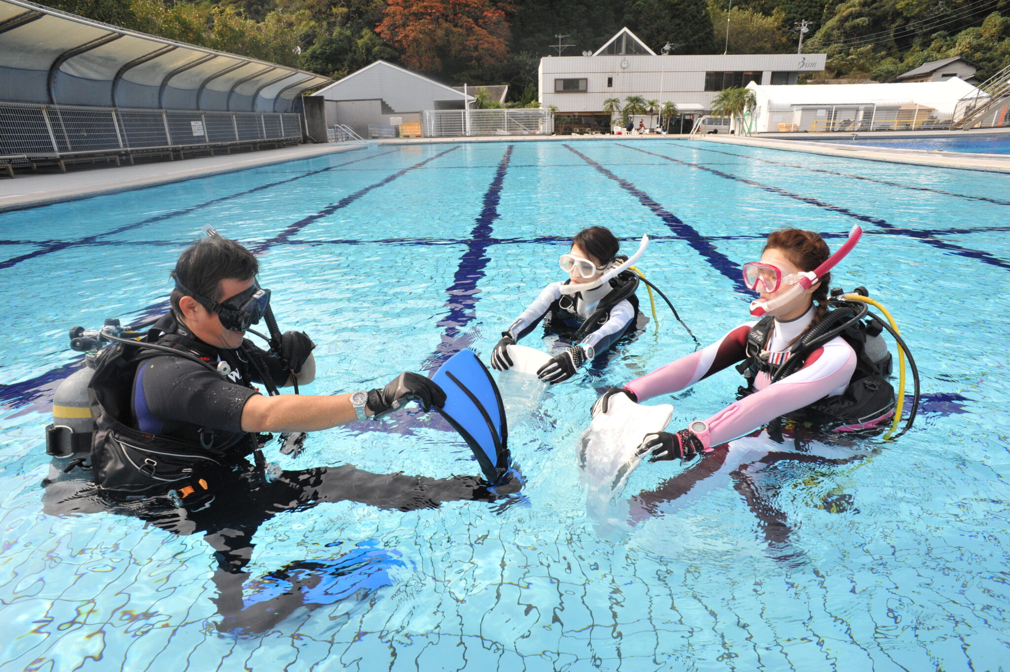 Scuba diver trying to fix a limp.