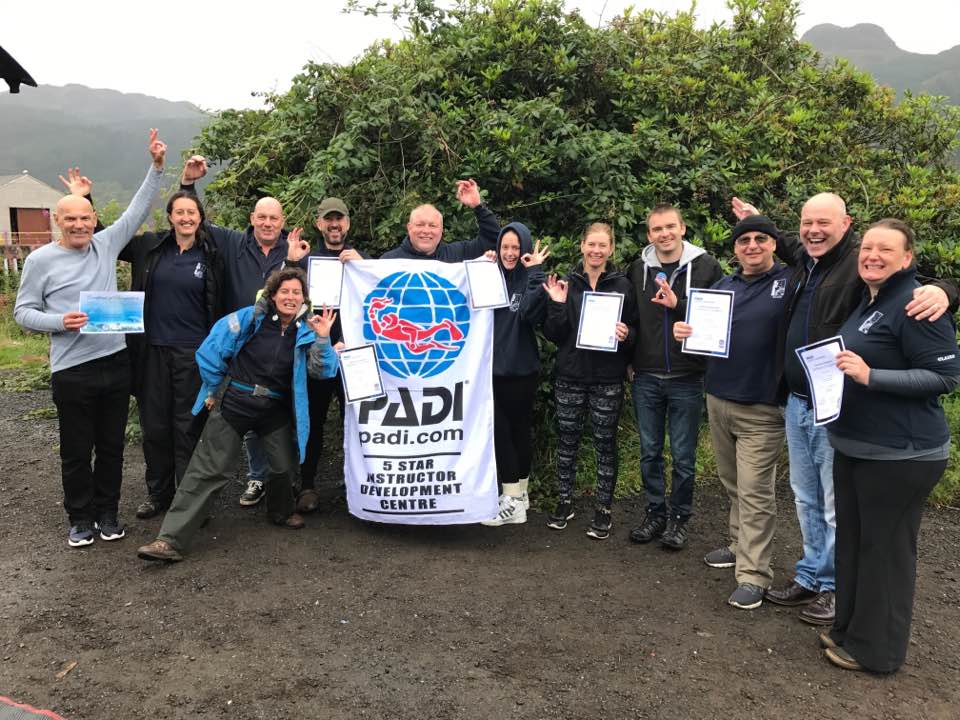 Smiling PADI Instructor candidates in Scotland