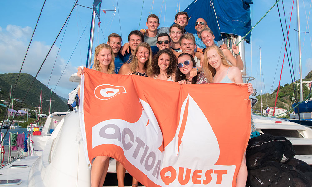 ActionQuest Group Photo with Flag