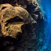 A diver in Silfra Canyon. Iceland