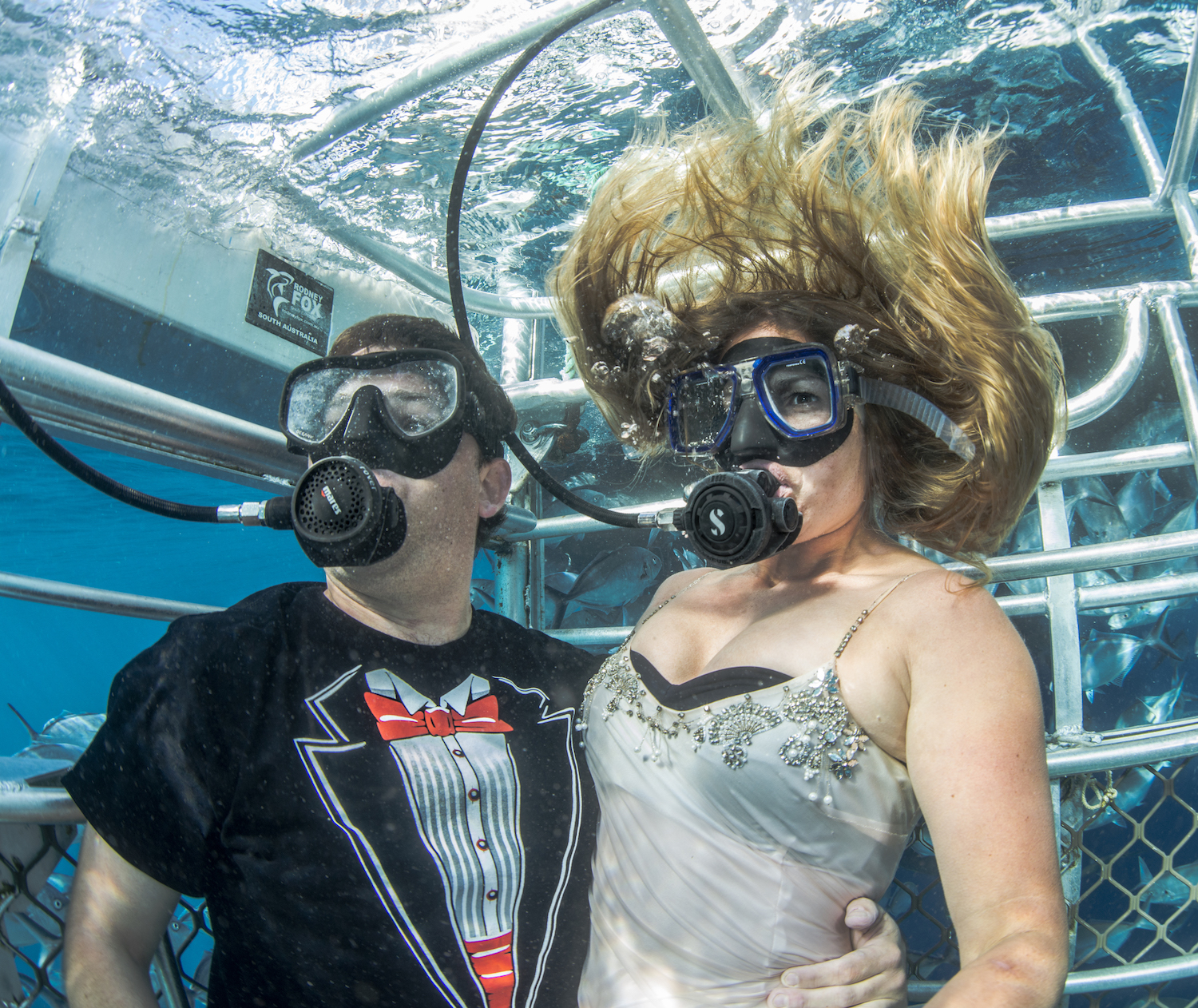 "Chris and I met on the shark dive boat where Chris was working (I was on assignment for National Geographic), and so that's where we decided to honeymoon (with a few of our diving friends). We decided to do a mock wedding shoot in the cage just for fun." Photo: Andrew Fox