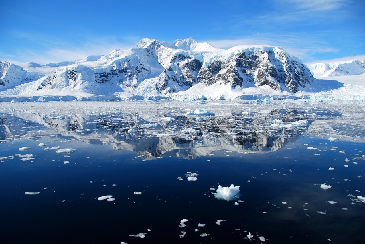 A topside view of Antarctica's ice-capped landscape, and one of the best destinations for ice diving holidays in January