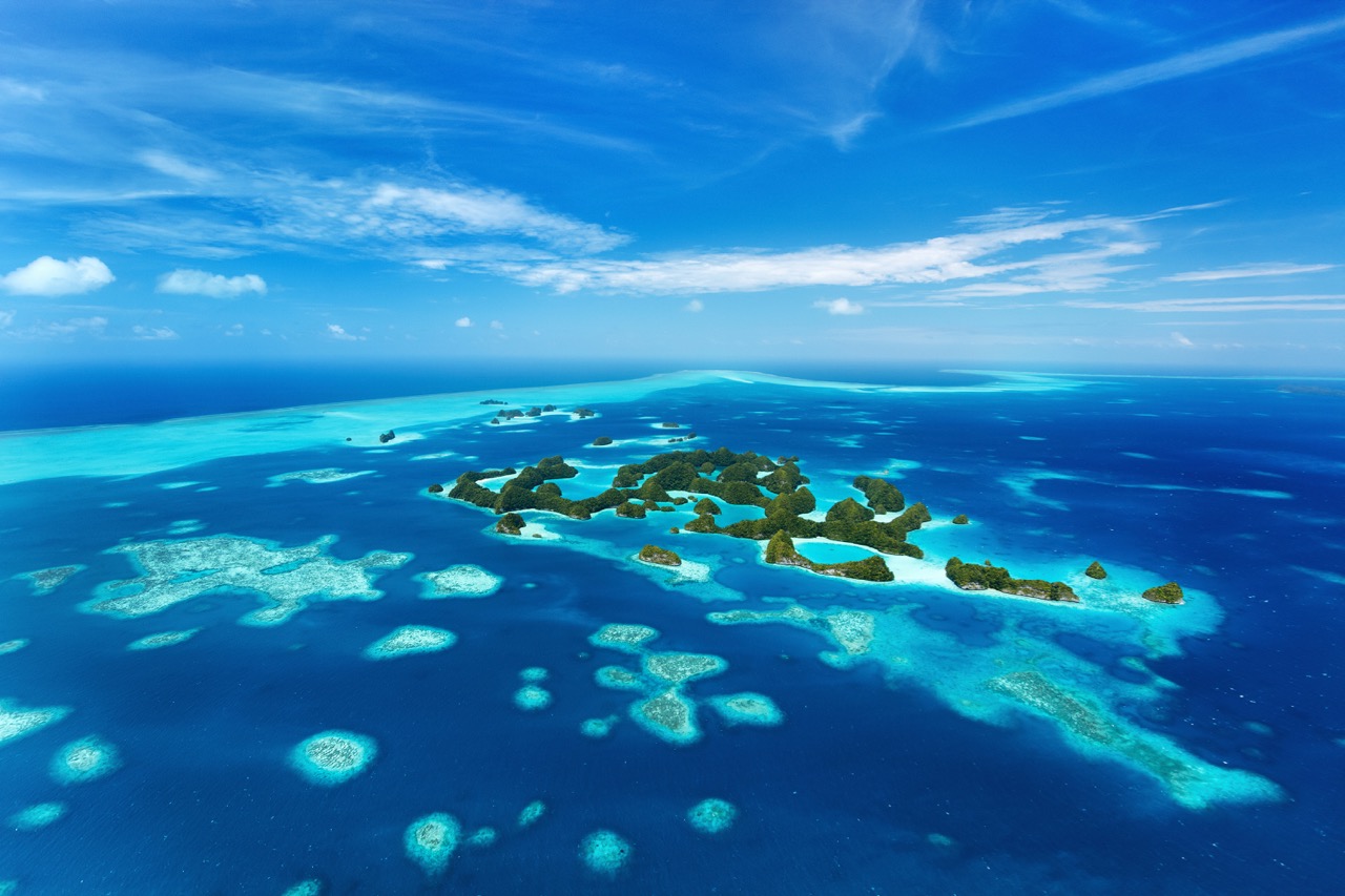 An aerial view of the islands of Palau, home to Blue Corner which is often named one of the 10 best dive sites in the world