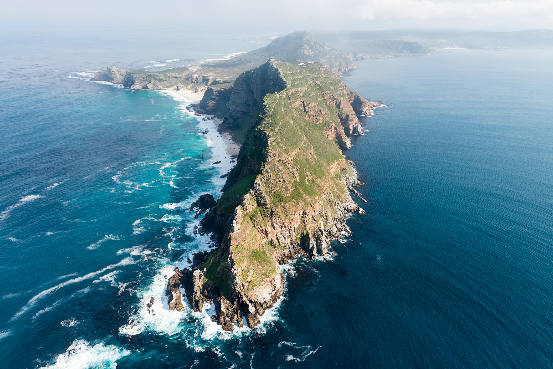 An aerial view of Cape Point, South Africa, one of the best scuba diving destinations for seals and big shark encounters