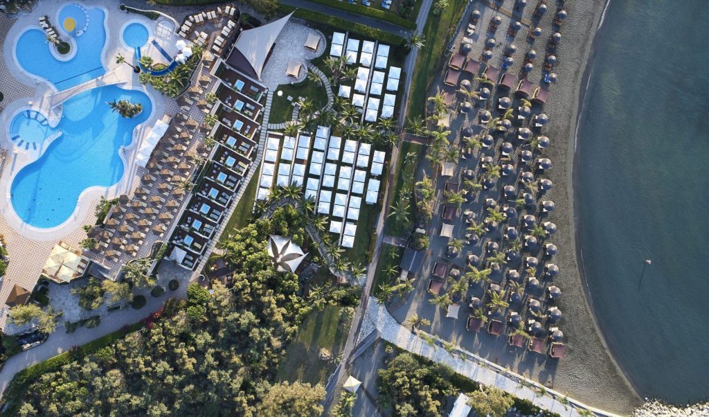 An aerial view of the pool and beach at the Four Seasons Hotel in Cyprus