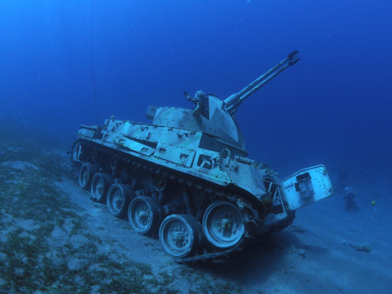 A Jordanian army tank submerged in Aqaba as part of the Underwater Military Museum, a popular scuba attraction in Jordan