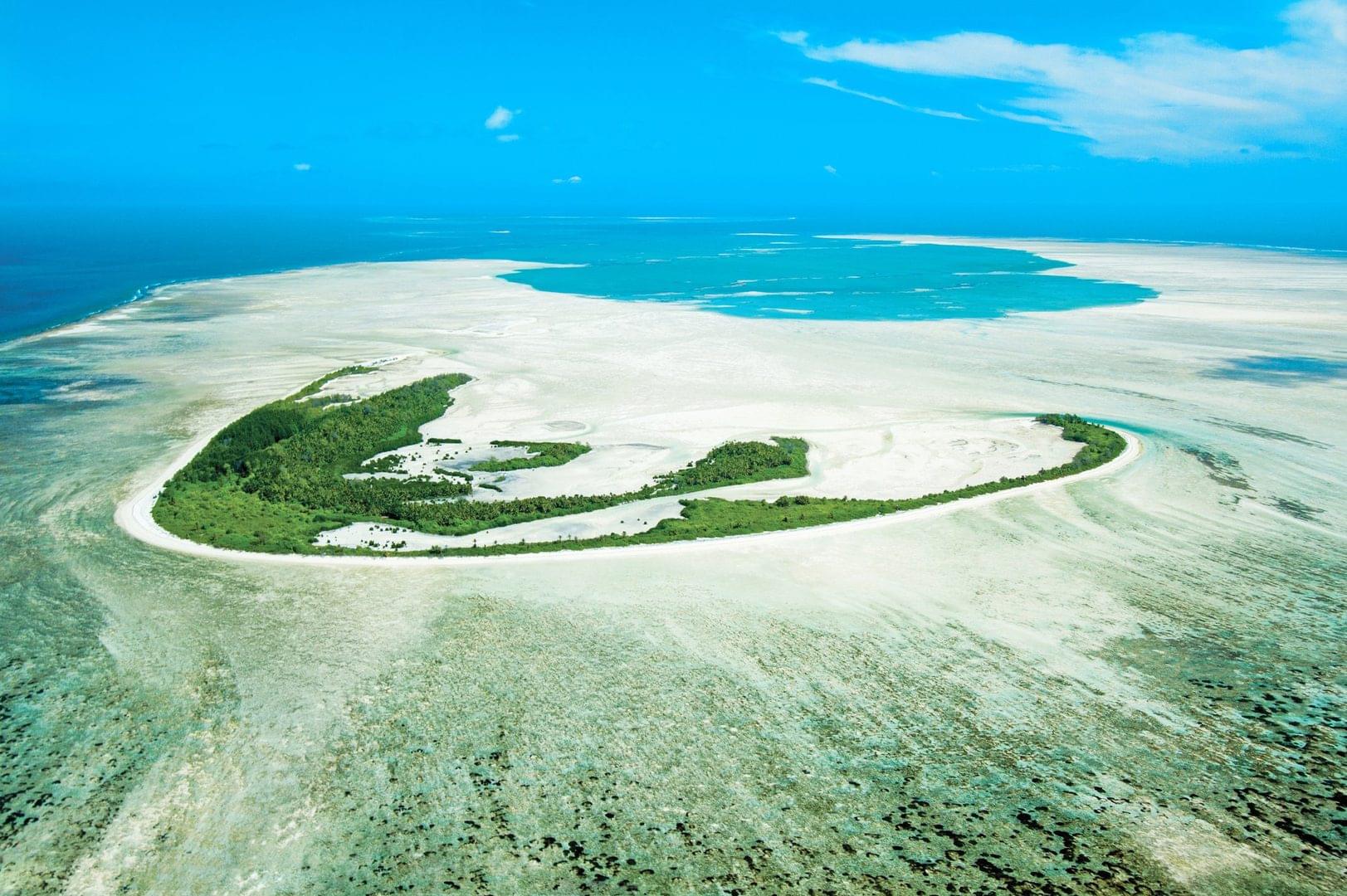 Alphonse Island in the Seychelles pictured from above and surrounded by verdant ocean landscapes