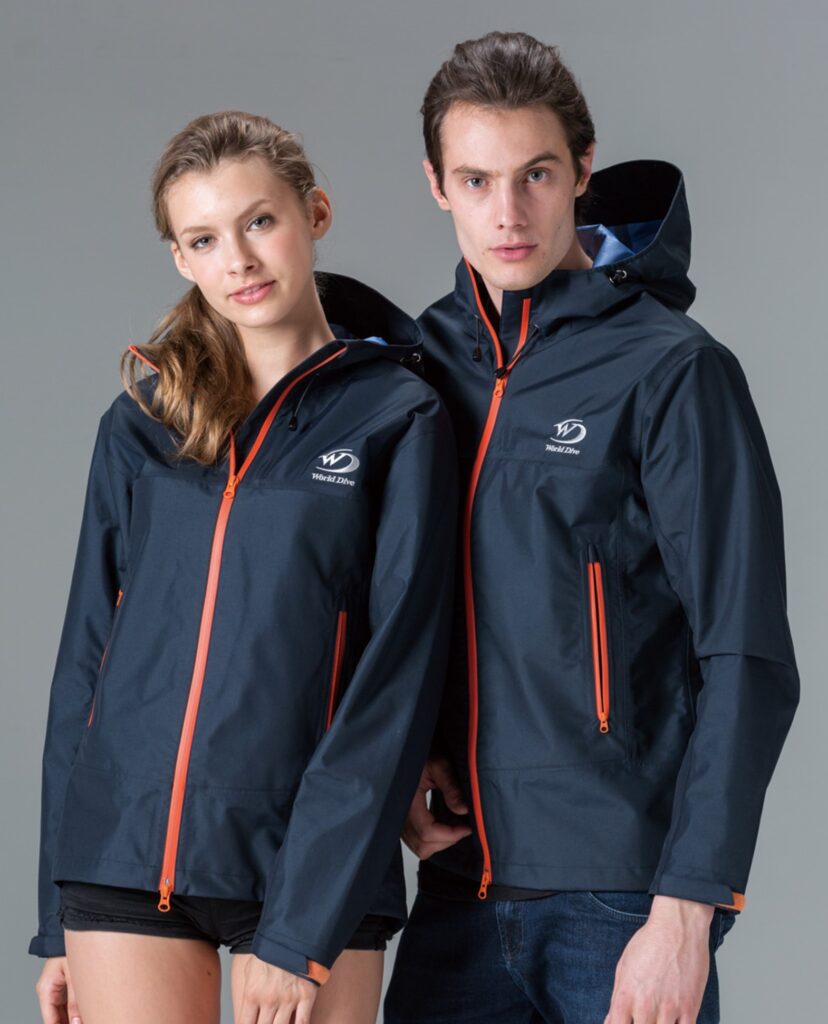 male and female model wearing active shell jacket by world dive