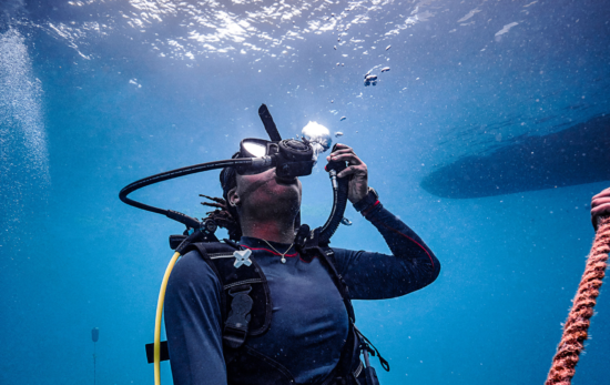 Master Scuba Diver descending for a dive