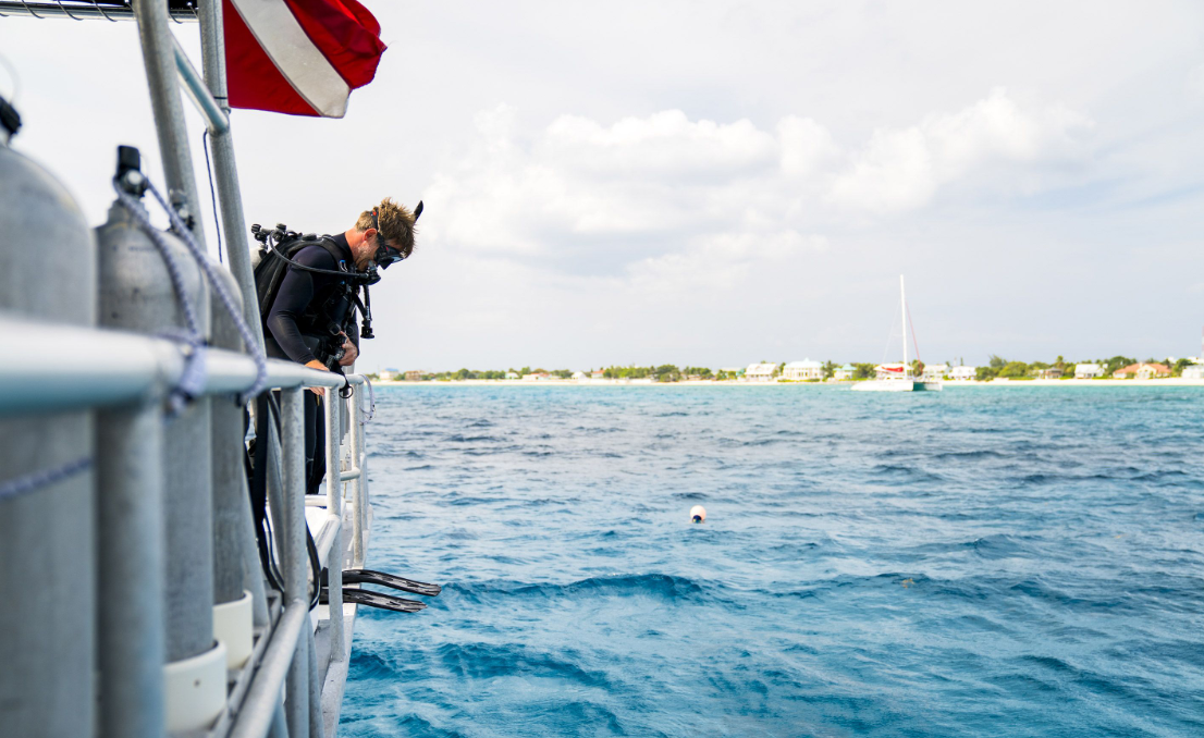 Diver - Boat - Tanks - Blue Water