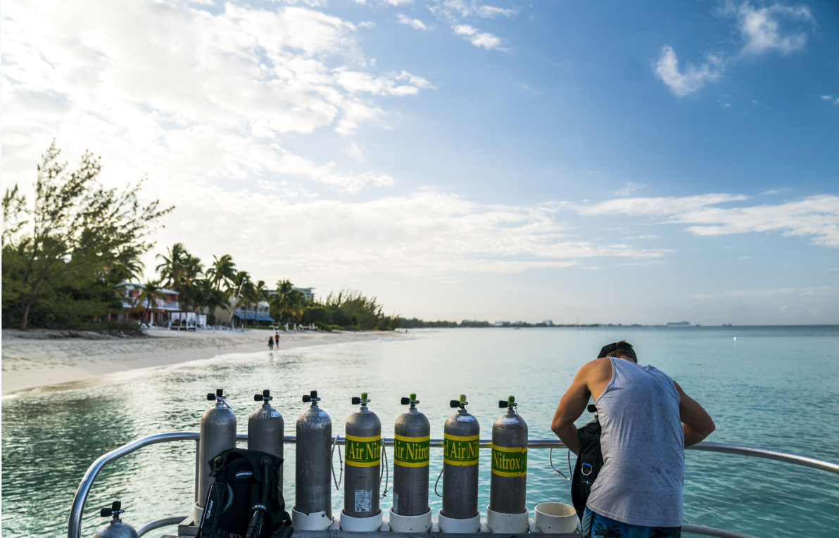 Diver - Boat - Tanks - Blue Water