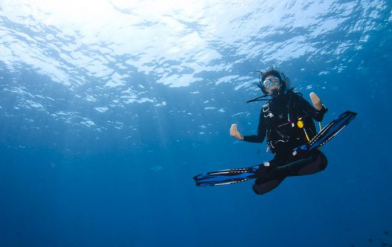 a diver with excellent buoyancy hovers like a genie