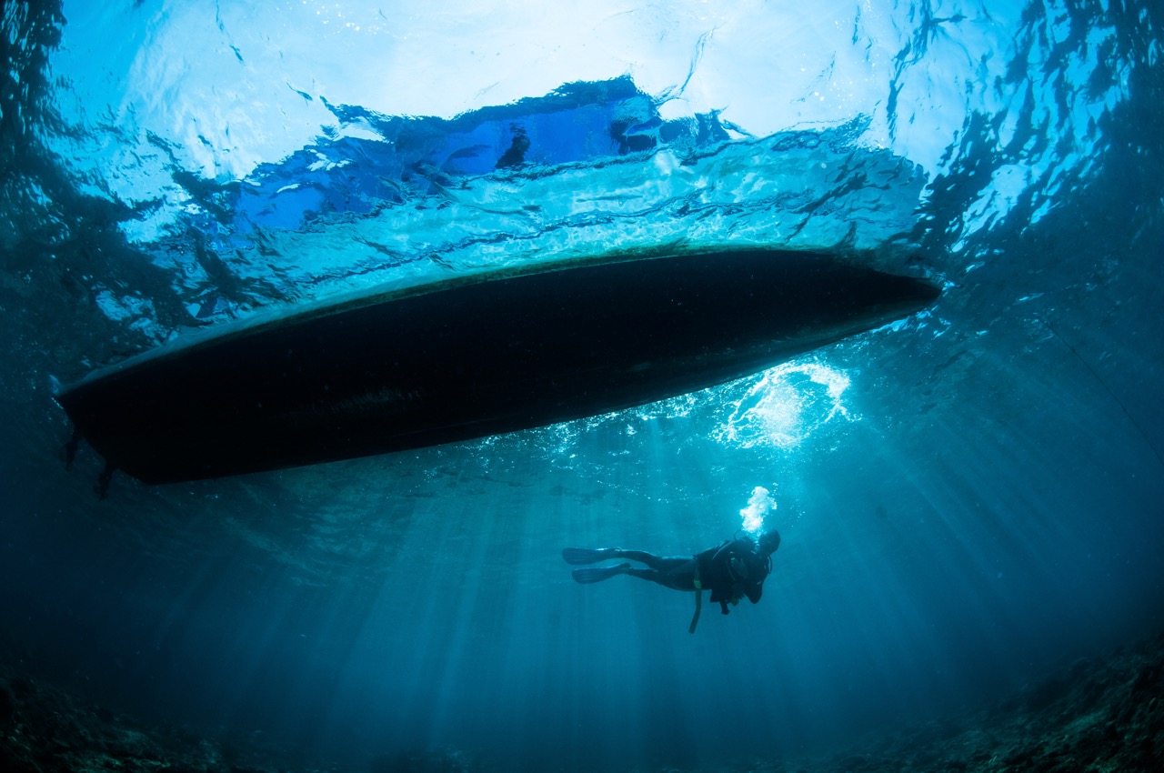 diver on a boat dive in Indonesia