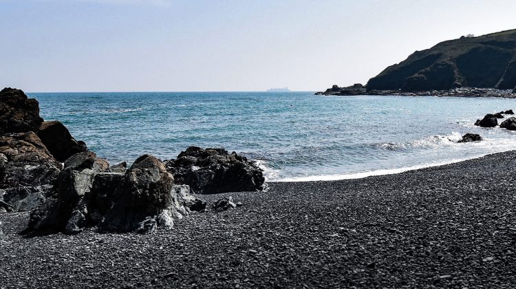 Porthkerris Beach, located on the Lizard Peninsula in Cornwall, UK