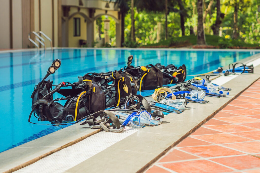 Scuba gear on side of pool during Scuba Certification course in Caribbean 