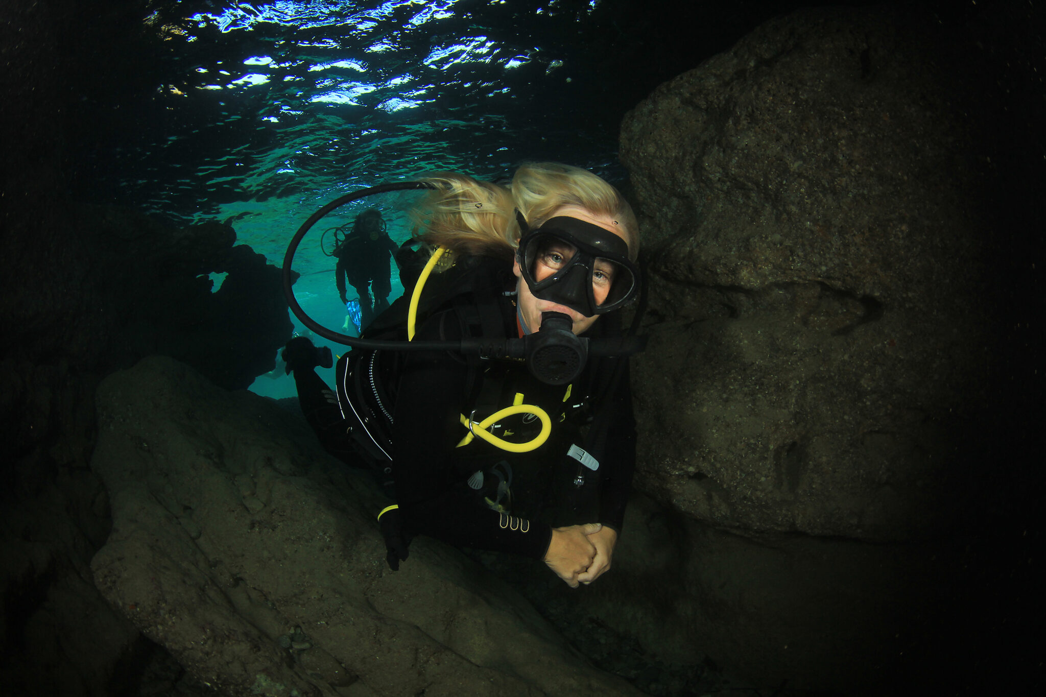 divemaster under water with friendly face