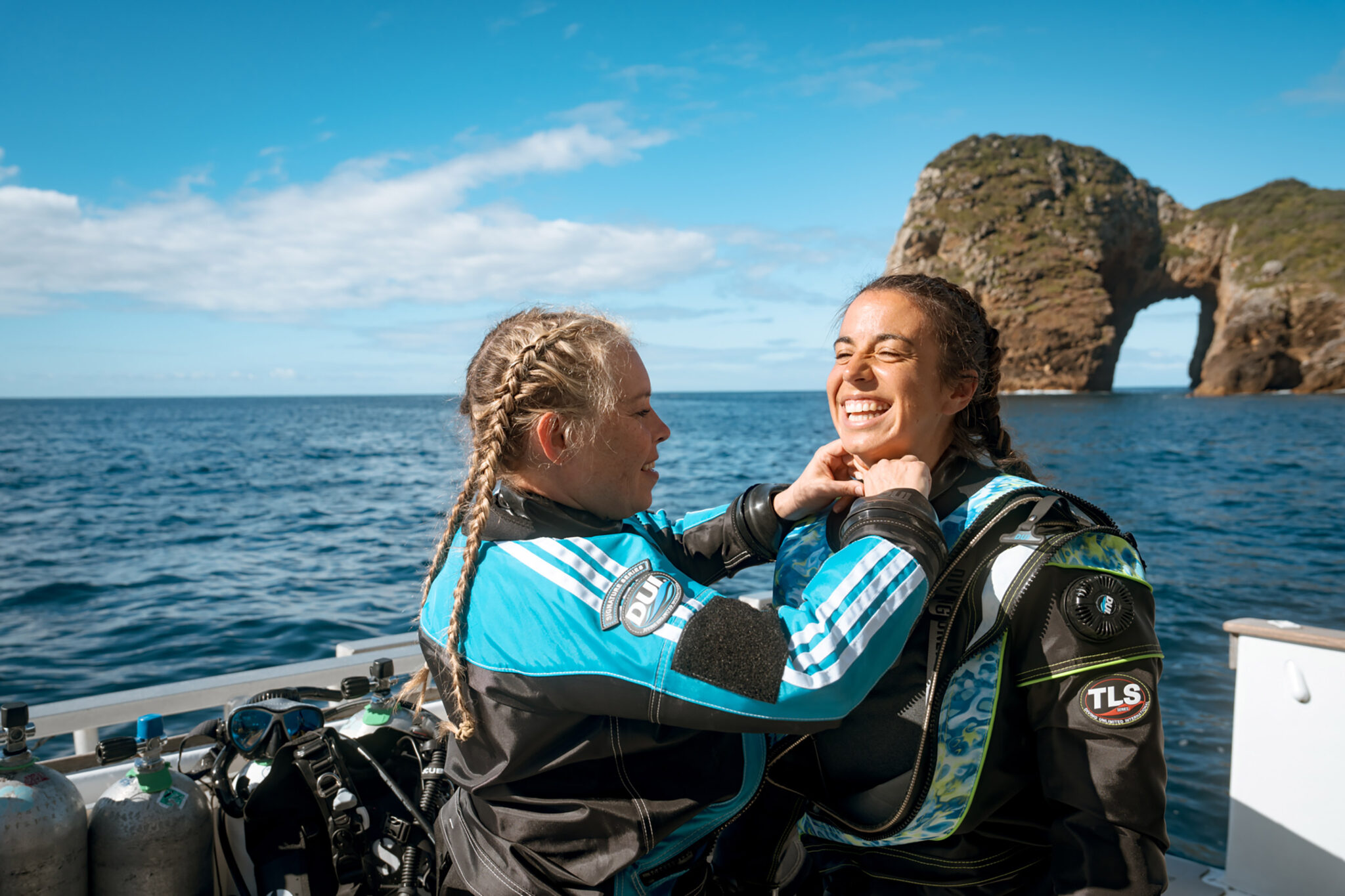 Two friends getting ready to scuba dive