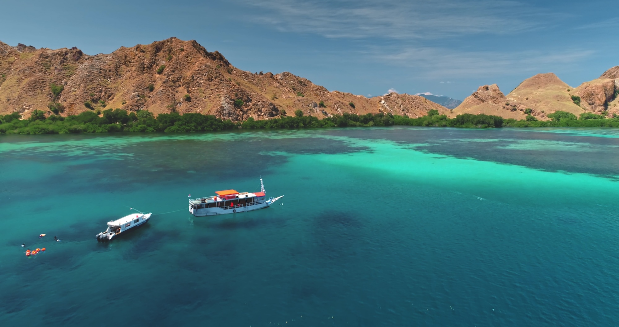dive boats photographed from above