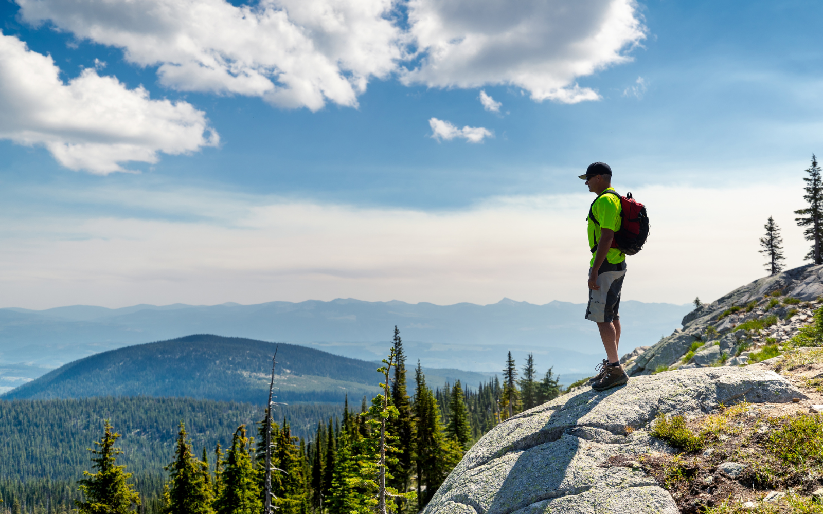 A hiker who has climbed to the top of a mountain at altitude, something that should be avoided immediately after scuba diving