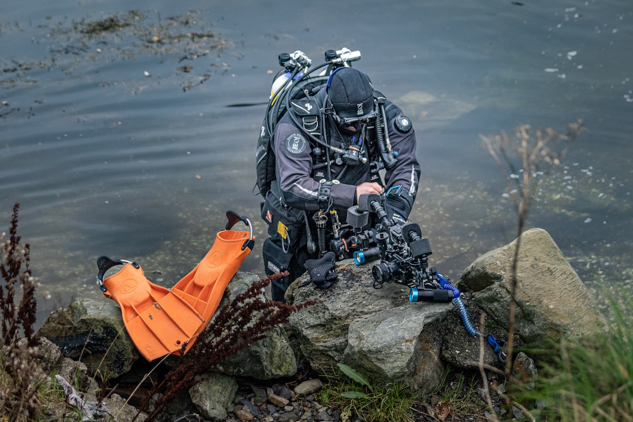 A diver gearing up for a dive in Scotland