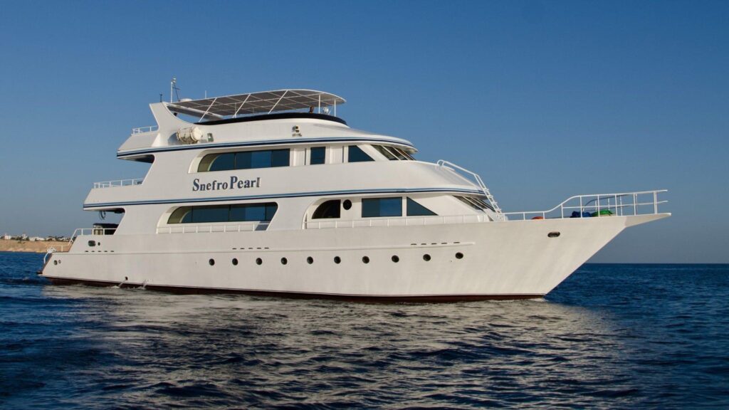 The Snefro Pearl scuba liveaboard boat floating on the water in the Red Sea