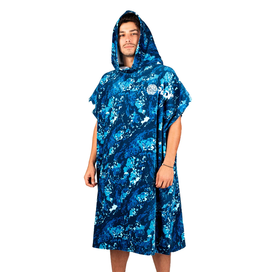 a man wearing a padi x leus ocean camo towel standing on a white background