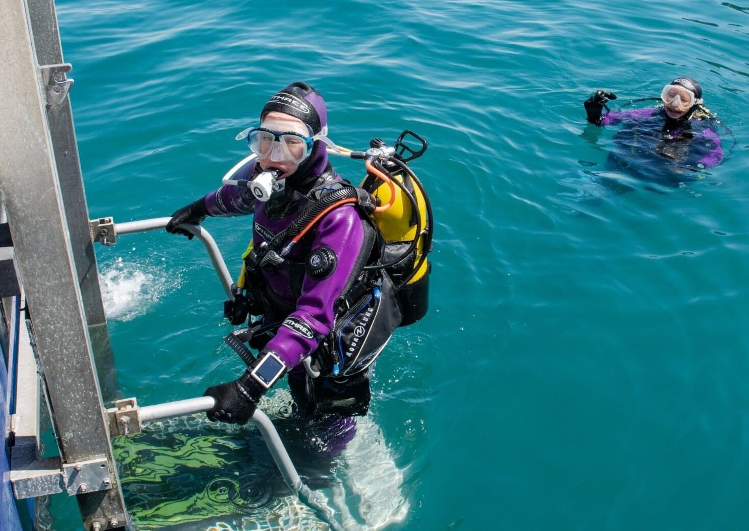 Miranda and Ollie Krestovnikoff exit the sea after scuba diving, a hobby where they can live unfiltered and share memories