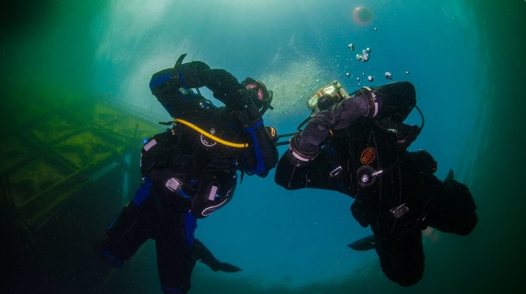 Two drysuit divers in Vobster, UK