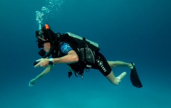 getting open water adaptive diver swimming by