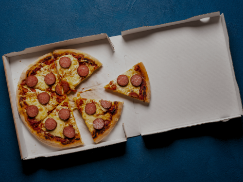 Pizza being delivered.