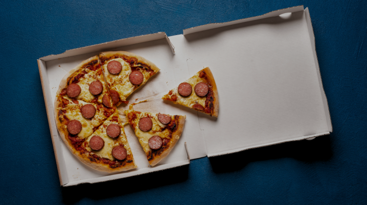 Pizza being delivered.