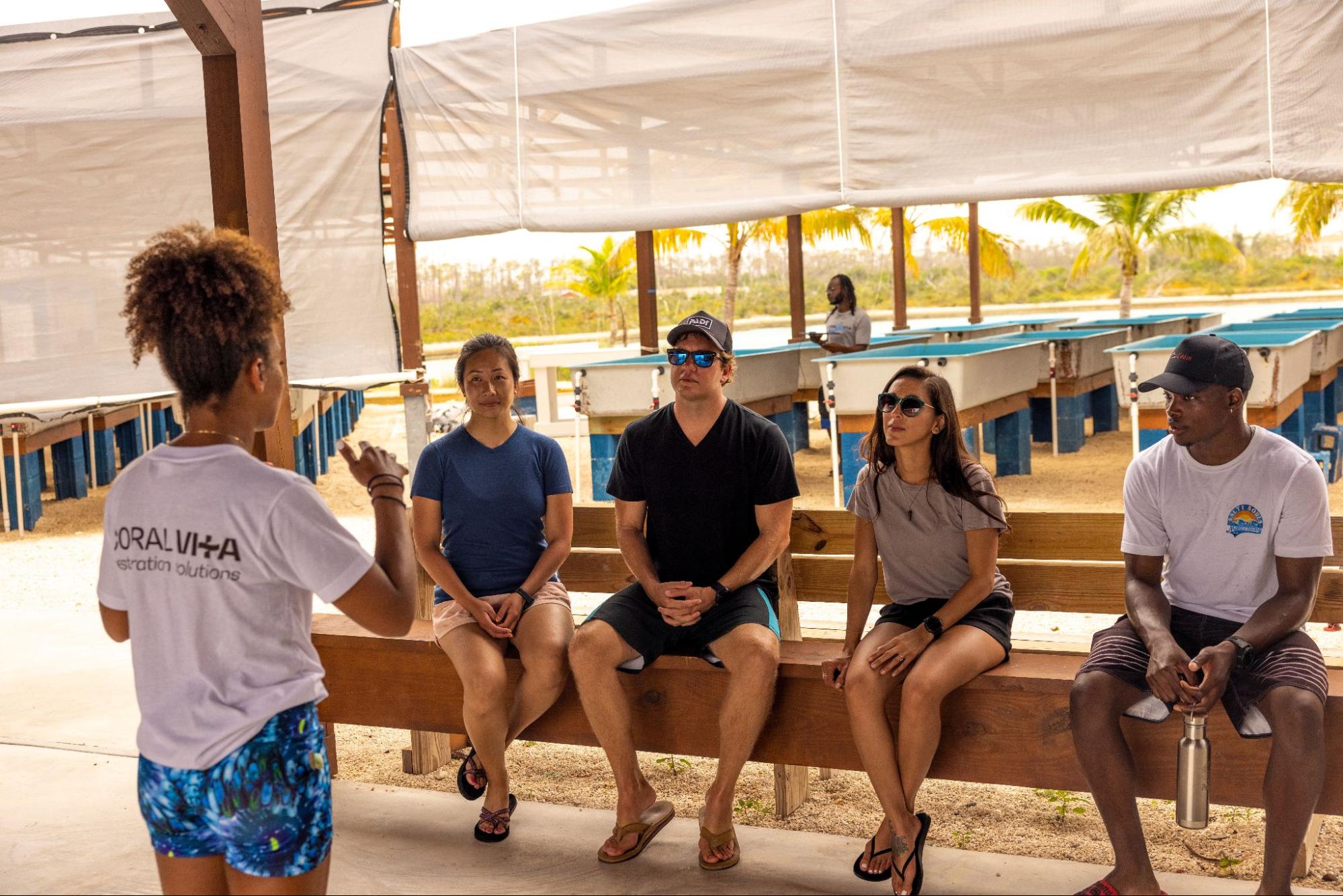 sustainable dive industry teacher speaking to a group