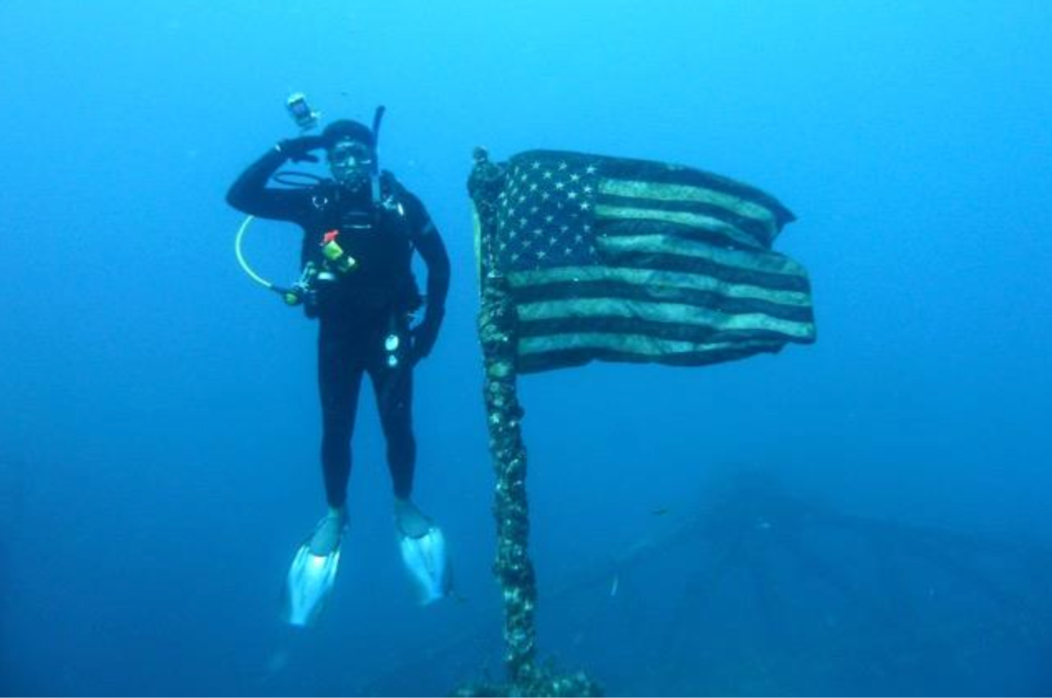 Image of Jack Fishman posing next to the USS Spiegel Grove Wreck.